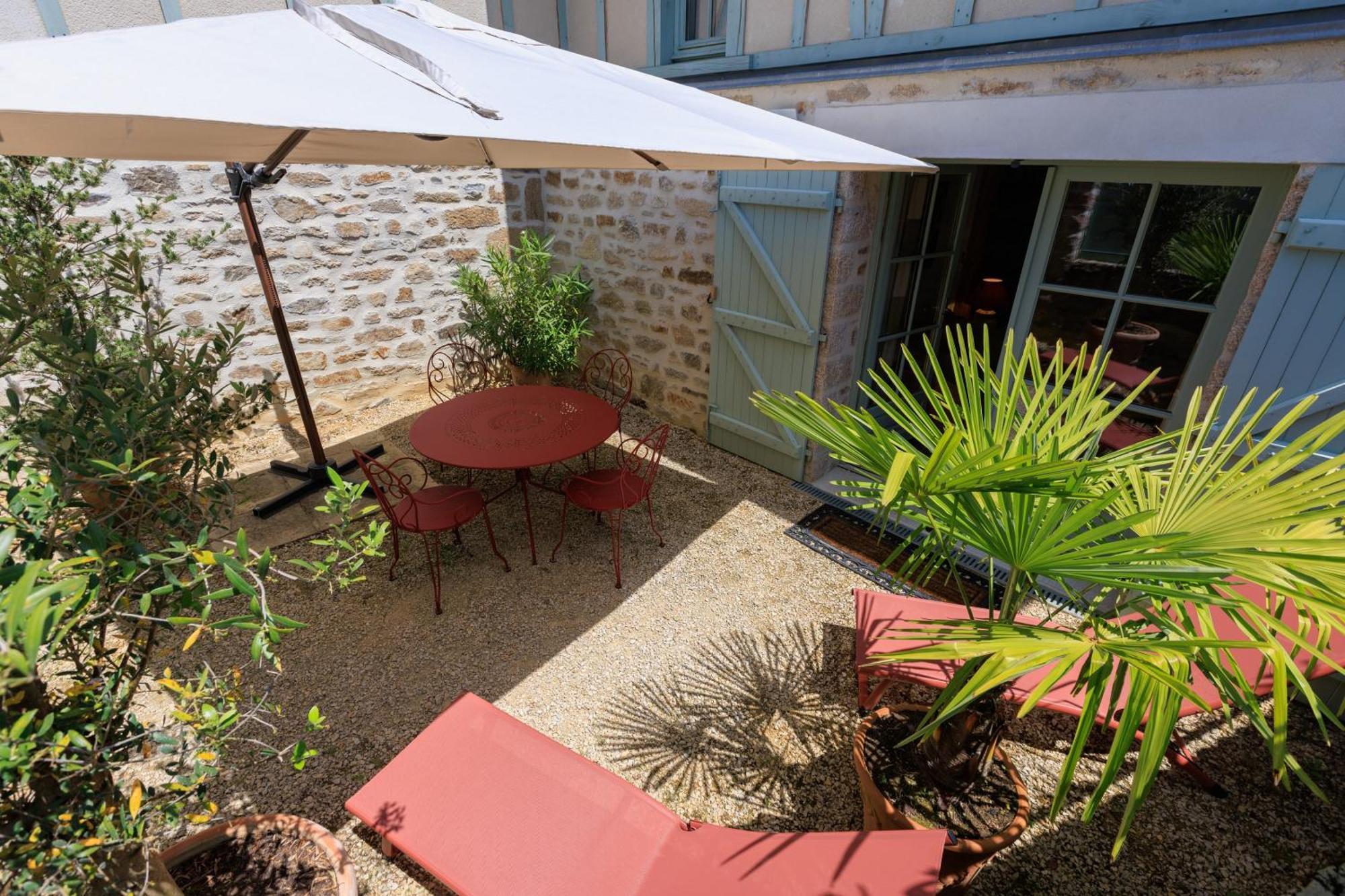 Maison d'hôtes Les jardins Saint Eloi Le Lonzac Exterior foto